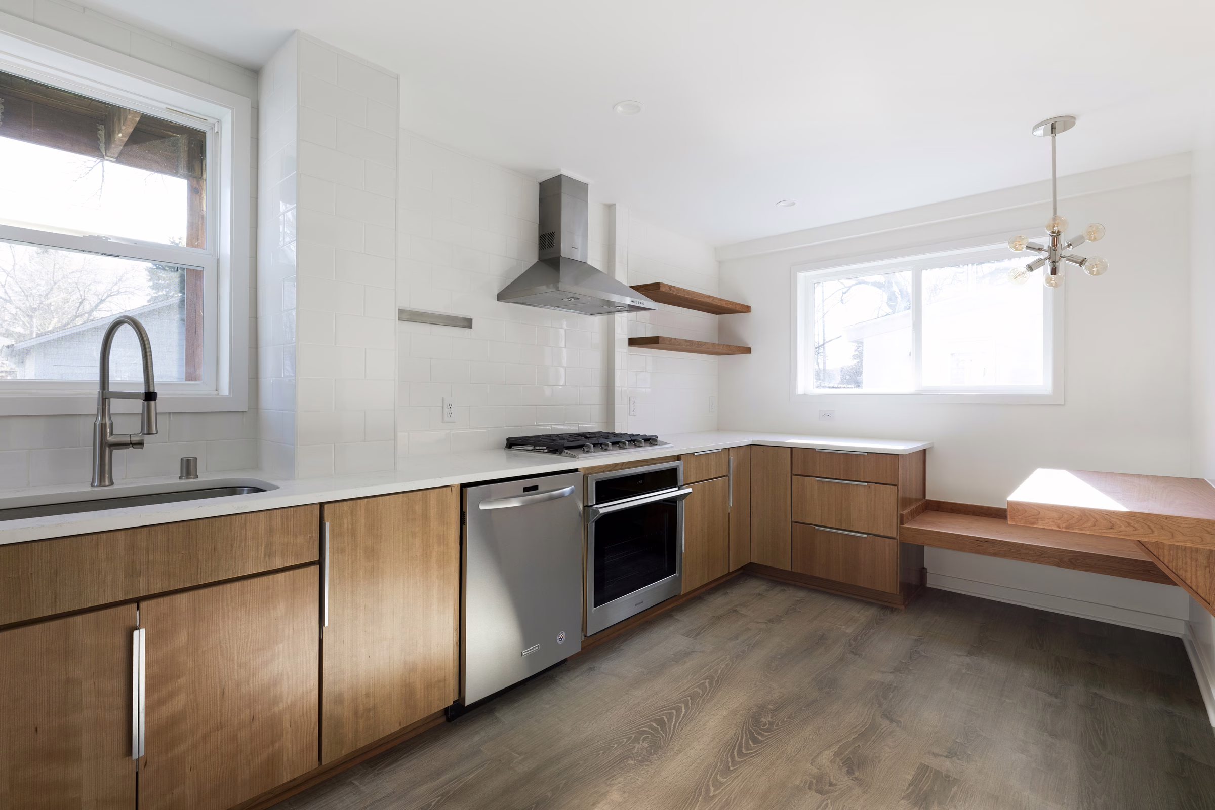 Kitchen addition with custom dining area in St Paul historic home