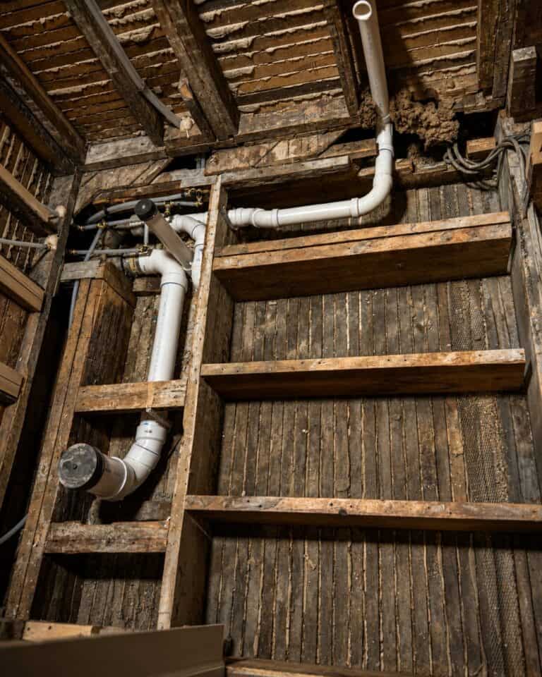 Plumbing installation in a construction site by woman-owned company.