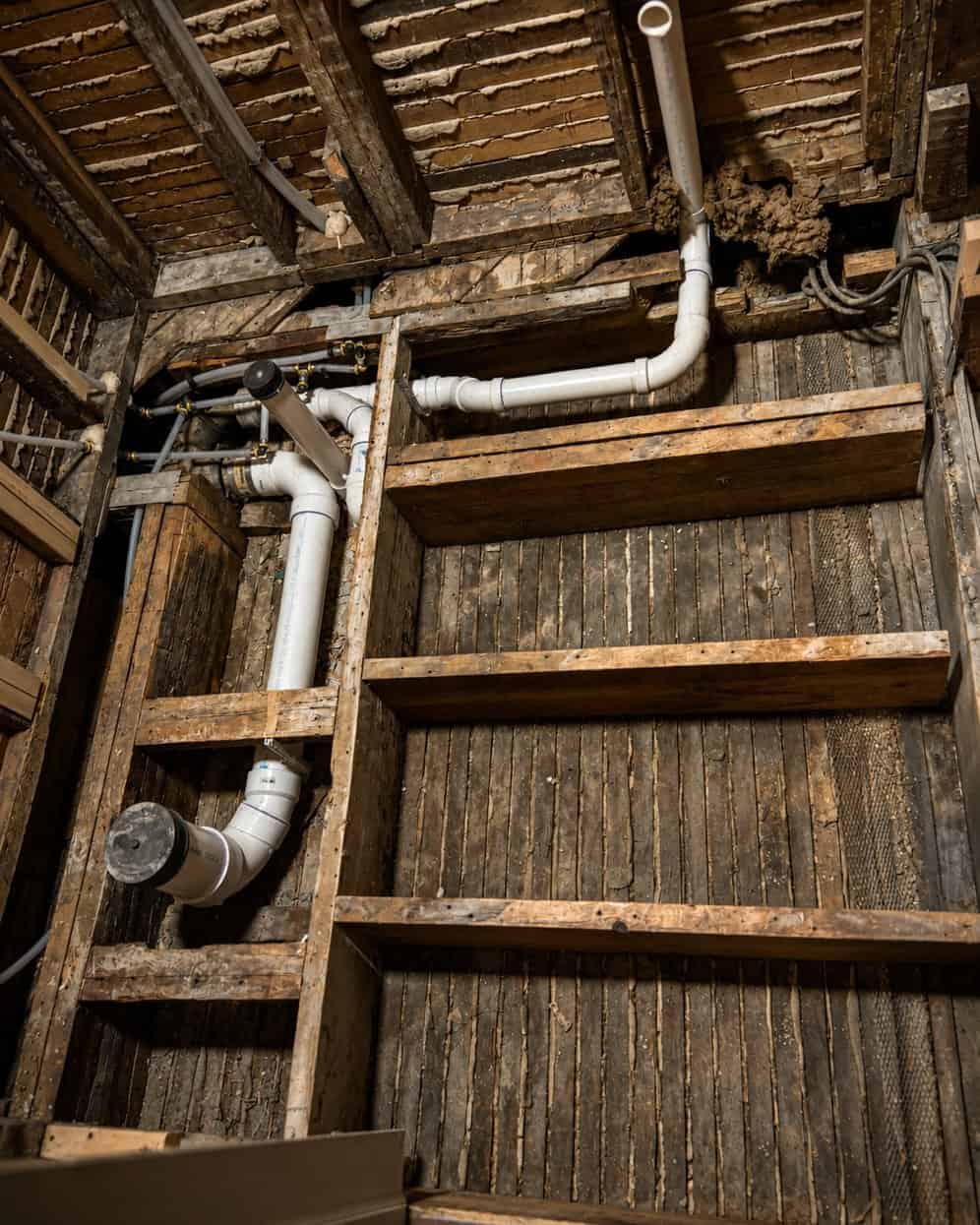 Plumbing installation in a construction site by woman-owned company.